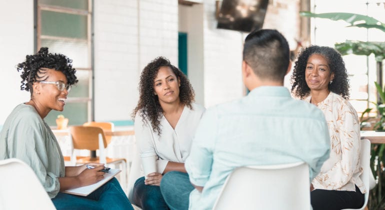 counselor meeting with clients